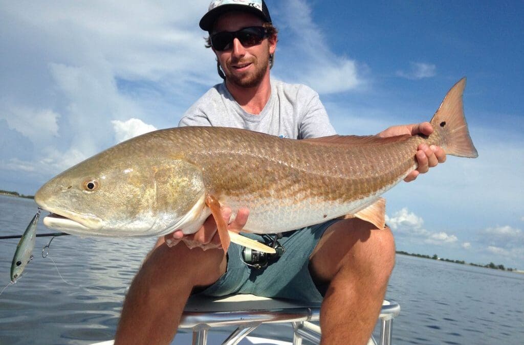 July 25 BIG over slot redfish schools FIRED UP!